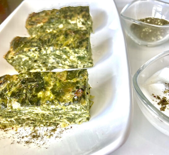 Vegetarian Spinach Quiche slices on entre dish for Pintrest