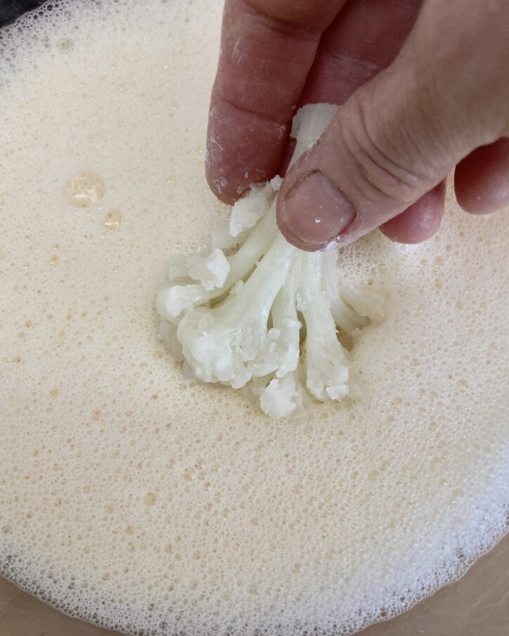 Dip entire nugget into liquid roux.