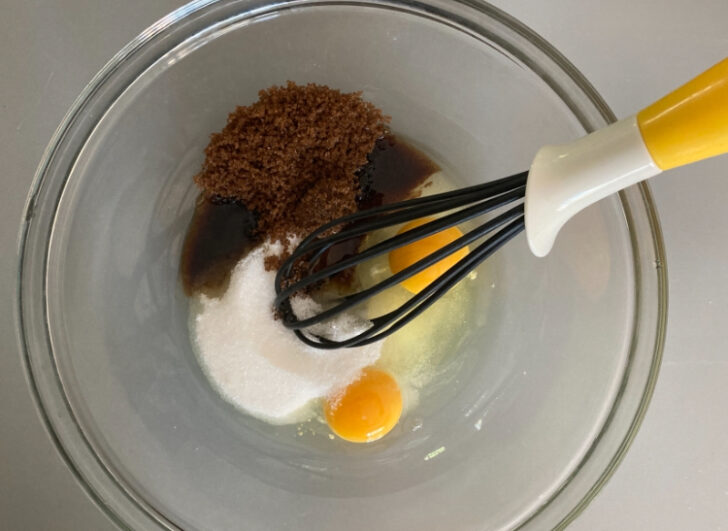 whisking sugar with eggs for brownies